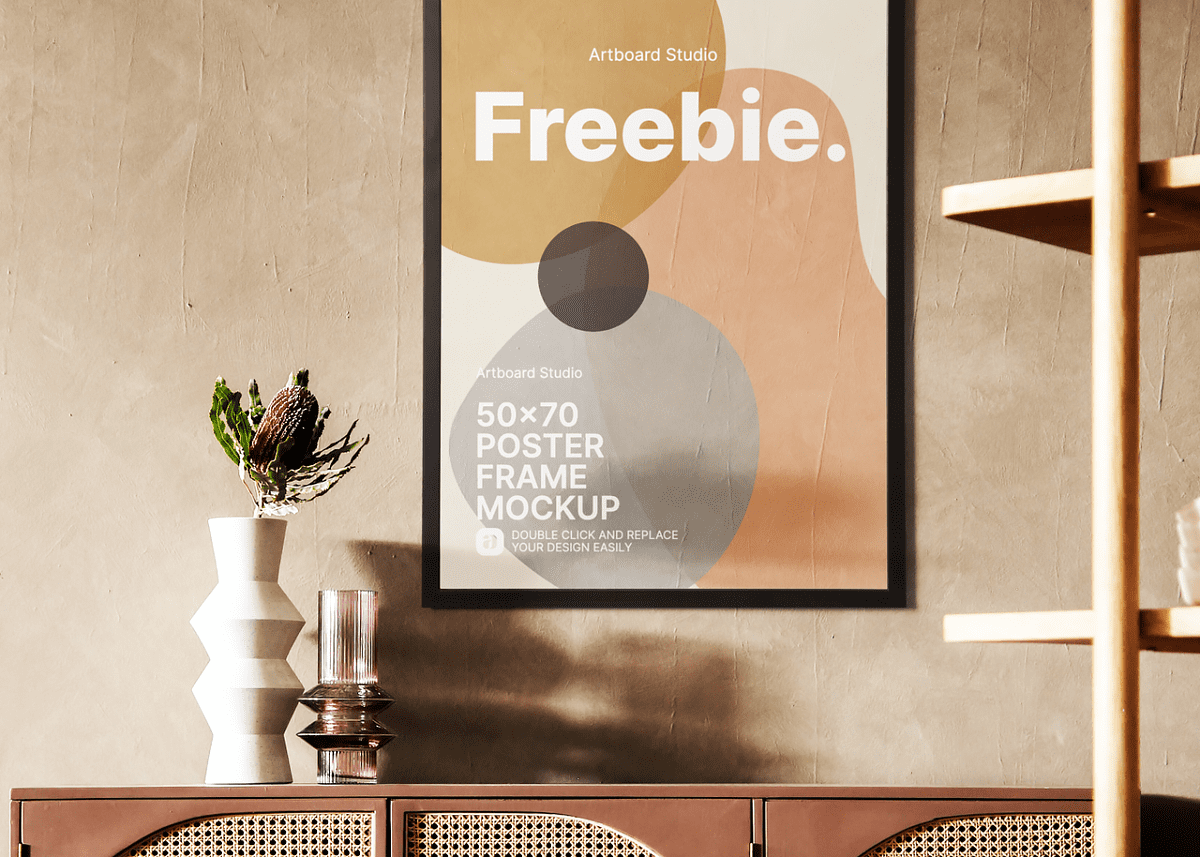 Wonderful poster mockup with a colorful and crazy illustration on wall background. Free Poster Frame Mockup Template